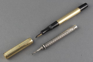 A gentleman's gold plated Conway Stewart fountain pen together with a silver propelling pencil