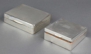 A square silver engine turned cigarette box 1934 3 1/2", a rectangular ditto 4", rubbed marks