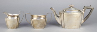 A Victorian silver 3 piece tea set with ebony mounts, London 1896, gross 610 grams 