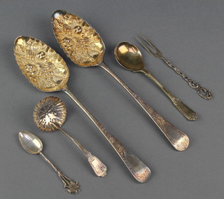 2 Georgian silver berry spoons London 1802 and 1807, a sifter spoon and 3 other items, 140 grams