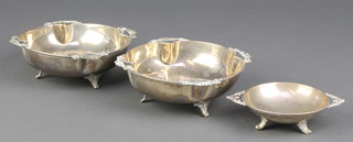 Three Continental silver bowls with scroll and floral handles 260 grams 