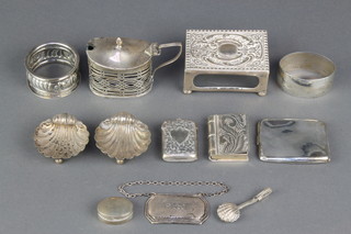 A Victorian silver match sleeve with repousse decoration Birmingham 1898, a pair of shell salts, minor items 186 grams 