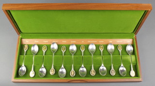 A set of 12 silver Royal Horticultural Society Flower spoons, 310 grams 