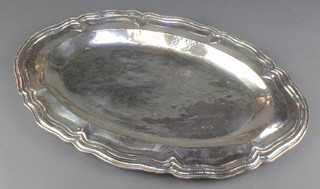 A Middle Eastern silver oval meat platter, 1125 grams 19" 