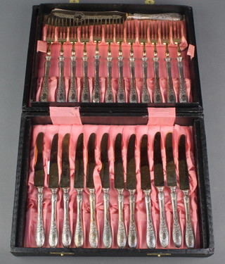 A cased set of 12 dessert eaters with silver handles and gilt blades 