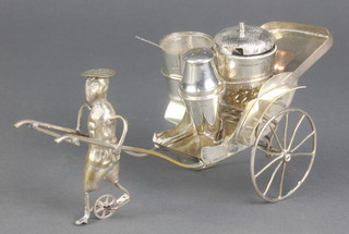 A Malaysian silver condiment in the form of a gentleman pulling a cart, 160 grams, 7" 