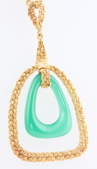 An 18ct yellow gold chrysoprase pendant on a 9ct gold chain 