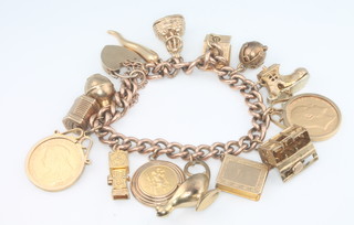 A 9ct yellow gold charm bracelet 49 grams including 2 mounted half sovereigns