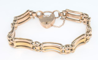 A 9ct yellow gold gate bracelet and padlock 15 grams