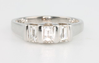 An 18ct white gold 3 stone baguette diamond ring, approx. 0.6ct 