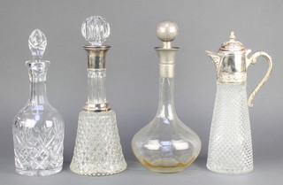 A cut glass mallet shaped decanter and stopper 12", 2 others and a plated mounted ewer