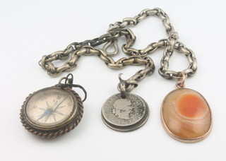 A gold mounted agate pendant, hung on a silver watch chain with 2 other items 