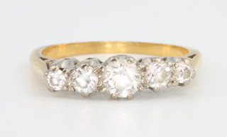 A yellow gold 5 stone diamond ring, size K 1/2