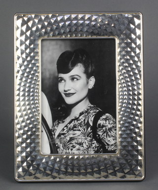 An Art Deco style silver photograph frame 8 1/2" x 6 1/2" 