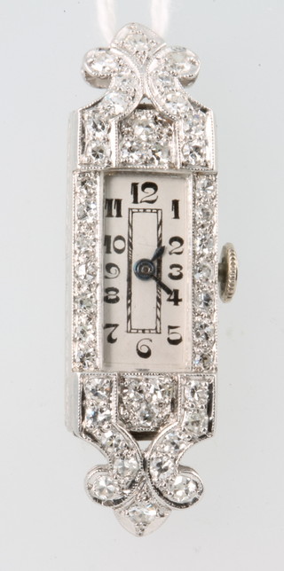 An Art Deco platinum and diamond lady's cocktail watch 