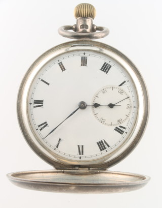 A gentleman's silver cased enamelled half hunter pocket watch with seconds at 6 o'clock