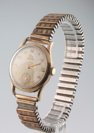 A gentleman's 9ct yellow gold Record wristwatch with seconds at 6 o'clock on a gilt bracelet 