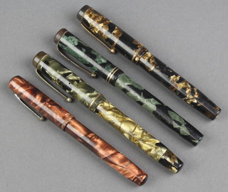 A gentleman's black and gold marbled Mentmore fountain pen and 3 others