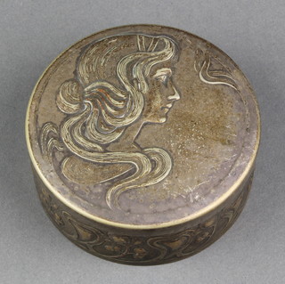 An Art Nouveau repousse silver plated circular box and cover with portrait lid and clear glass liner 3 1/2" 