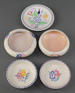 A pair of 1950's Poole dishes decorated with flowers 4" and 3 others