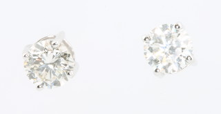 A pair of 18ct white gold single stone diamond earstuds approx. 1.0ct