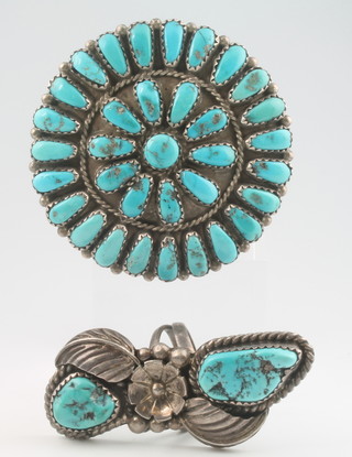 A Navajo silver and turquoise ring and brooch 