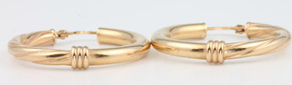 A pair of 9ct yellow gold hoop earrings 4 grams