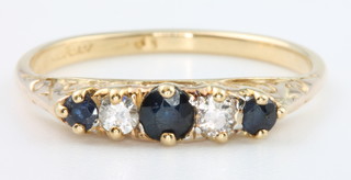 An 18ct sapphire and diamond ring, size P 