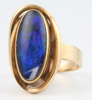 A 9ct yellow gold black opal ring size L 