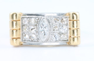An 18ct yellow gold marquise and brilliant cut diamond ring size P 