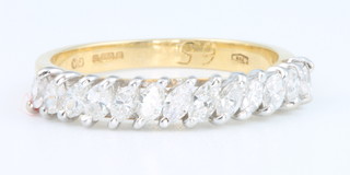 An 18ct yellow gold half hoop eternity ring approx 0.75ct, size M