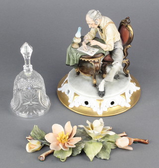 A Capodimonte figure of a philatelist 8", a ditto group of roses 9" and a glass bell 