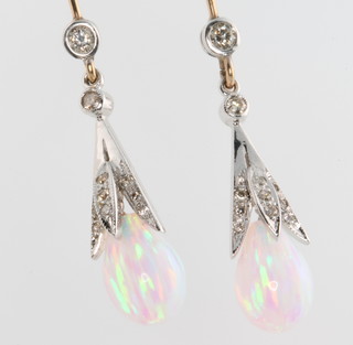 A pair of 18ct opal and diamond drop earrings