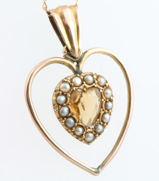 A Victorian yellow gold citrine and heart shaped pendant 