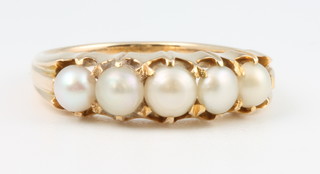 A Victorian yellow gold 5 stone pearl dress ring, size N