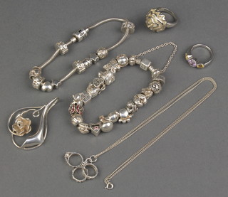 Two silver bracelets, 2 ditto rings, a necklace and brooch