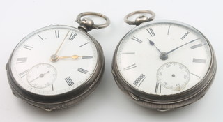 2 silver cased key wind pocket watches with seconds at 6 o'clock 