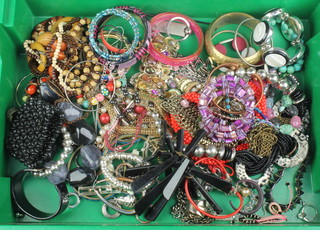 A quantity of costume jewellery including bracelets etc