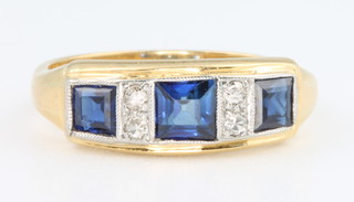 An 18ct yellow gold sapphire 3 and diamond 4 stone ring, size R 