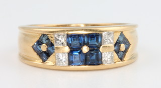An 18ct yellow gold sapphire and diamond ring, size L