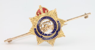 A 9ct yellow gold and enamel Royal Army Service Corps sweetheart brooch 