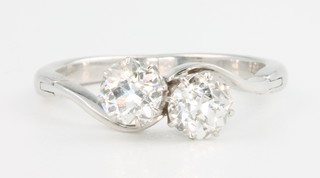 A good white gold 2 stone diamond ring, each approx 0.75ct in an unusual expanding shank, size S 1/2