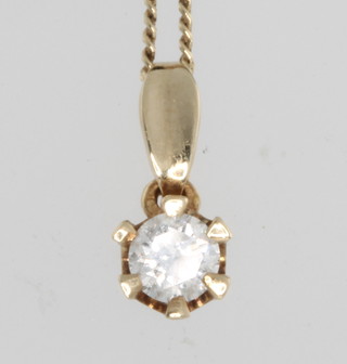 A 9ct yellow gold chain and an 18ct yellow gold single stone diamond pendant approx. 0.4ct 