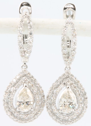 A pair of 18ct white gold pear shaped diamond ear studs 