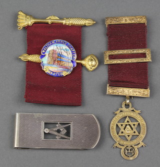 A silver gilt masonic jewel, one other and a masonic silver money clip