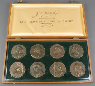 A cased set of 8 Hans Christian Andersen bronze medallions