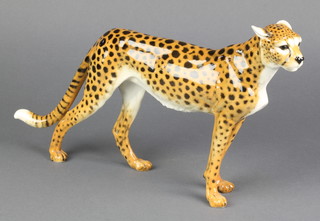 A German porcelain figure of a standing cheetah 15" 