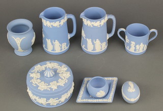 A Wedgwood blue Jasperware cylindrical box and cover 5", 2 ditto jugs, a cup, 2 vases, ashtray and egg box 
