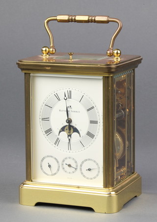 A Matthew Norman gilt metal day, date, calendar and moon phase repeating carriage clock, the back plate signed and number 1781 5 1/2" 