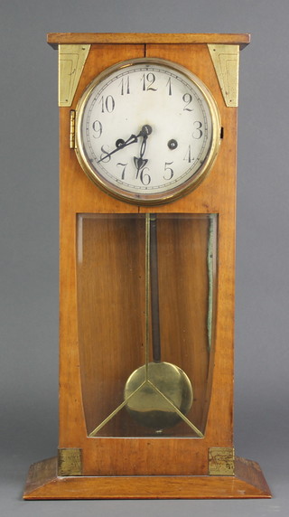 An 8 day 4 glass clock with silvered dial and Arabic numerals contained in a mahogany gilt mounted case 